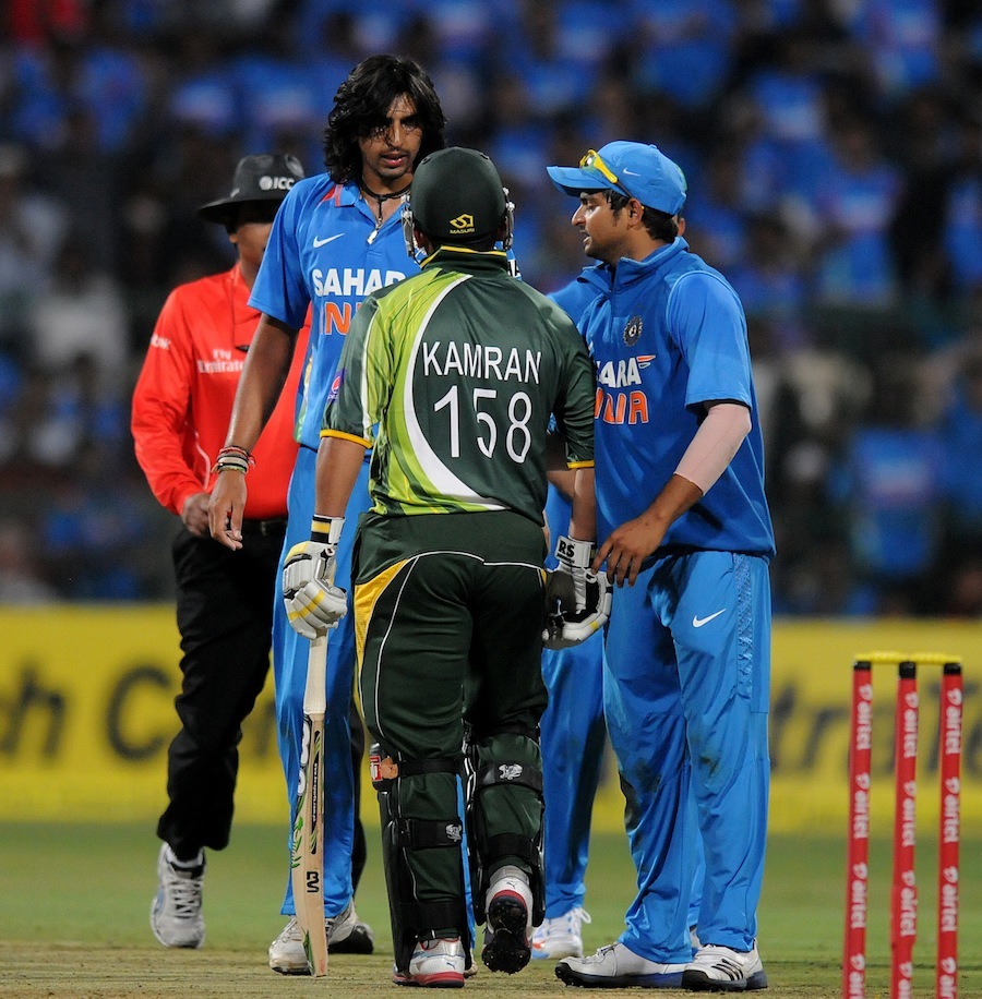 Ishant Sharma and Kamran Akmal get into it mid-pitch in the first T20I