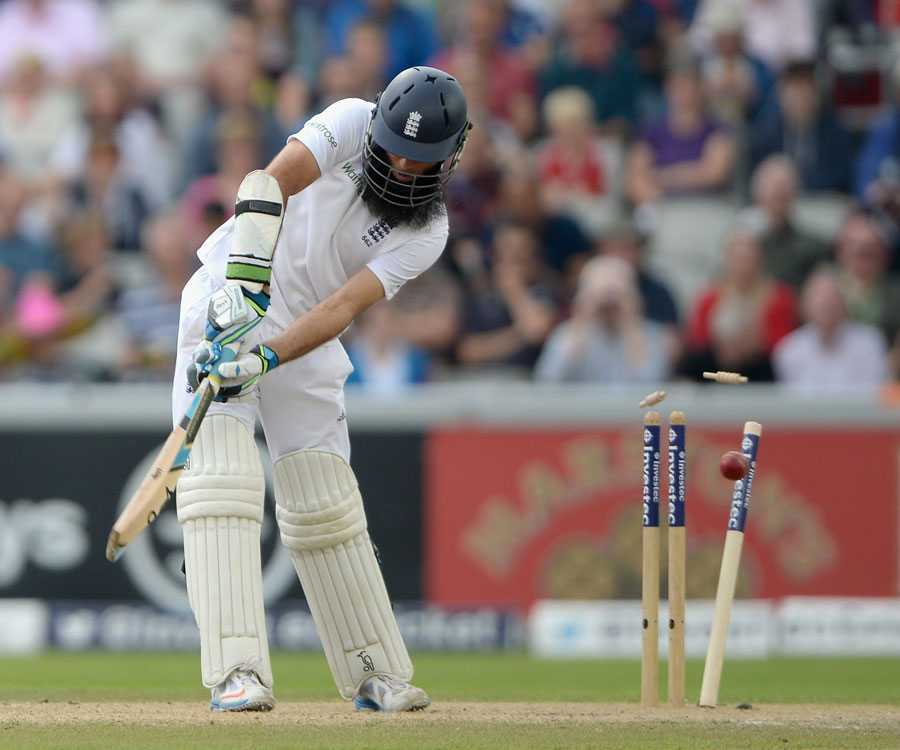 Mo' power to Aaron: Moeen Ali is bowled by a full and fast inswinging delivery at Old Trafford, 2014