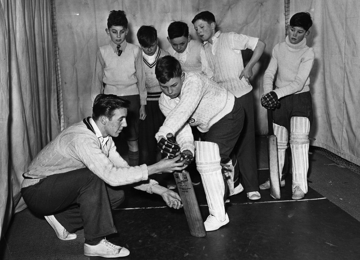 Hold on: how much should you guide a young batsman's grip?