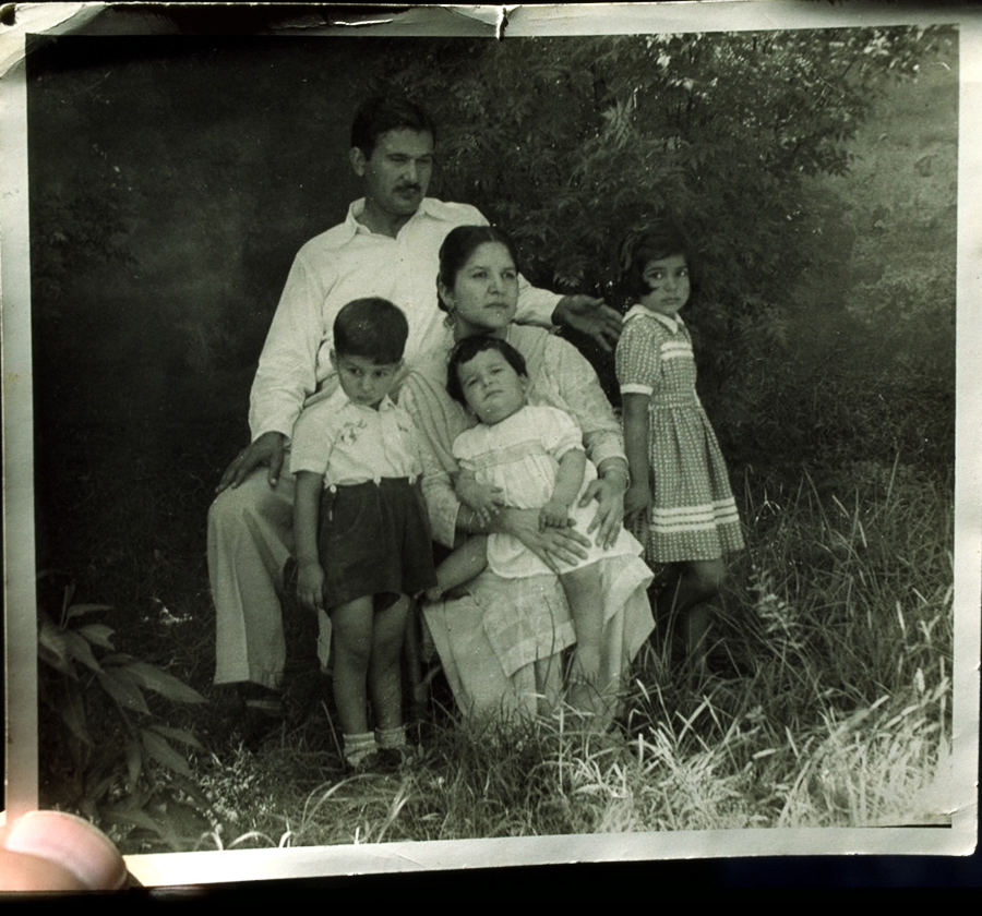 A young Imran with his parents and sisters