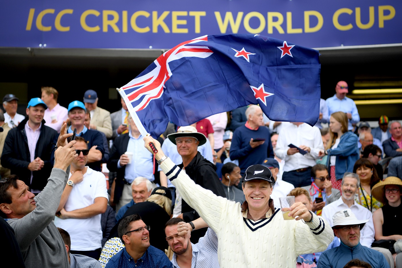 The age of beige: a New Zealand fan in vintage colours in the stands