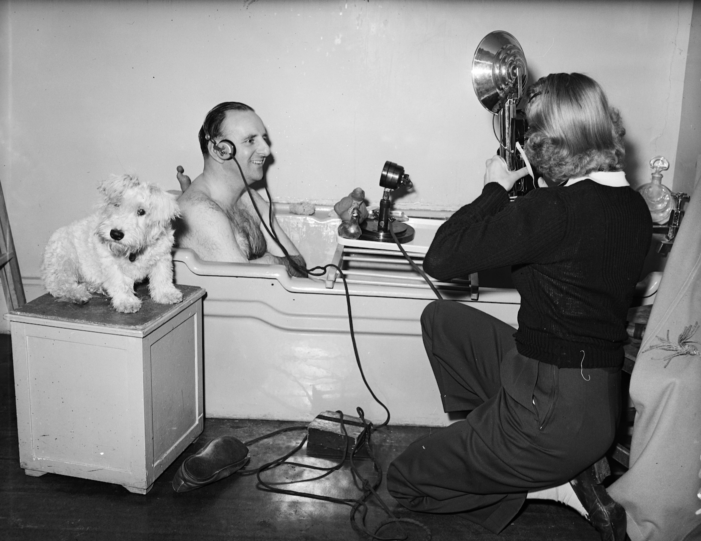 Commentator Brian Johnston and pooch gave us a prescient glimpse of what working from home would entail