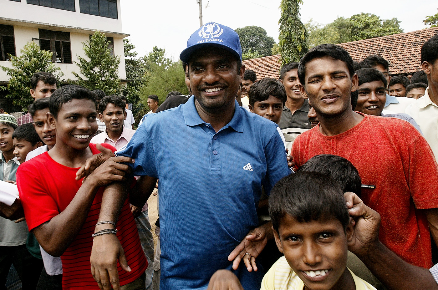 Murali at a refugee camp for tsunami survivors in Kinniya in the north-east, the year after the disaster