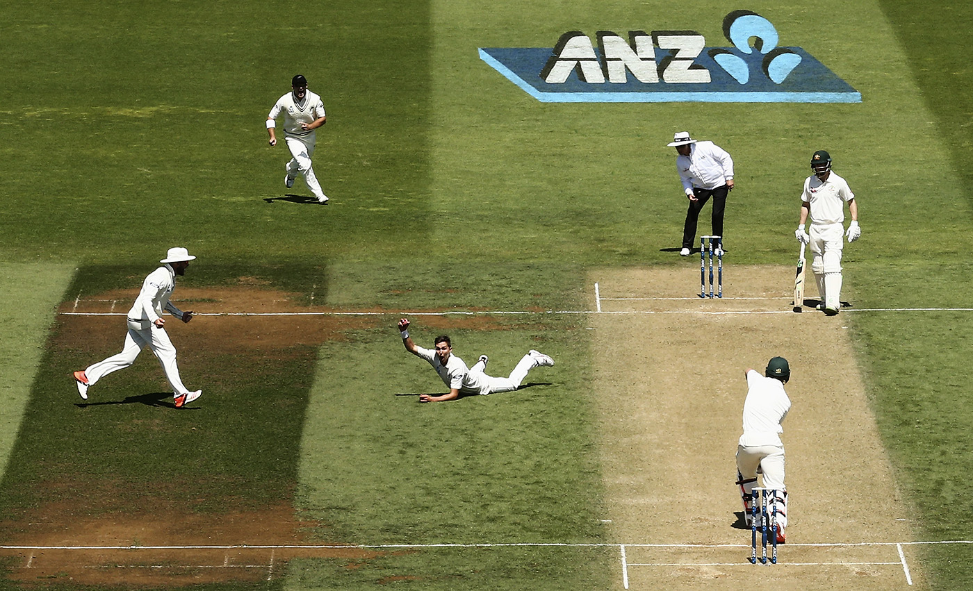 Locked and bolted: Boult takes a one-handed stunner off his own bowling to dismiss Mitch Marsh in Wellington, 2016