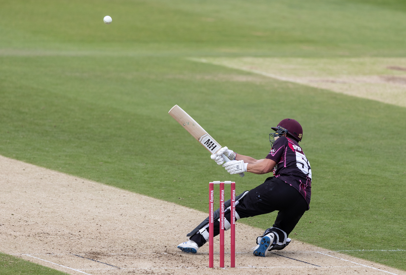 Roelof van der Merwe scoops the ball 