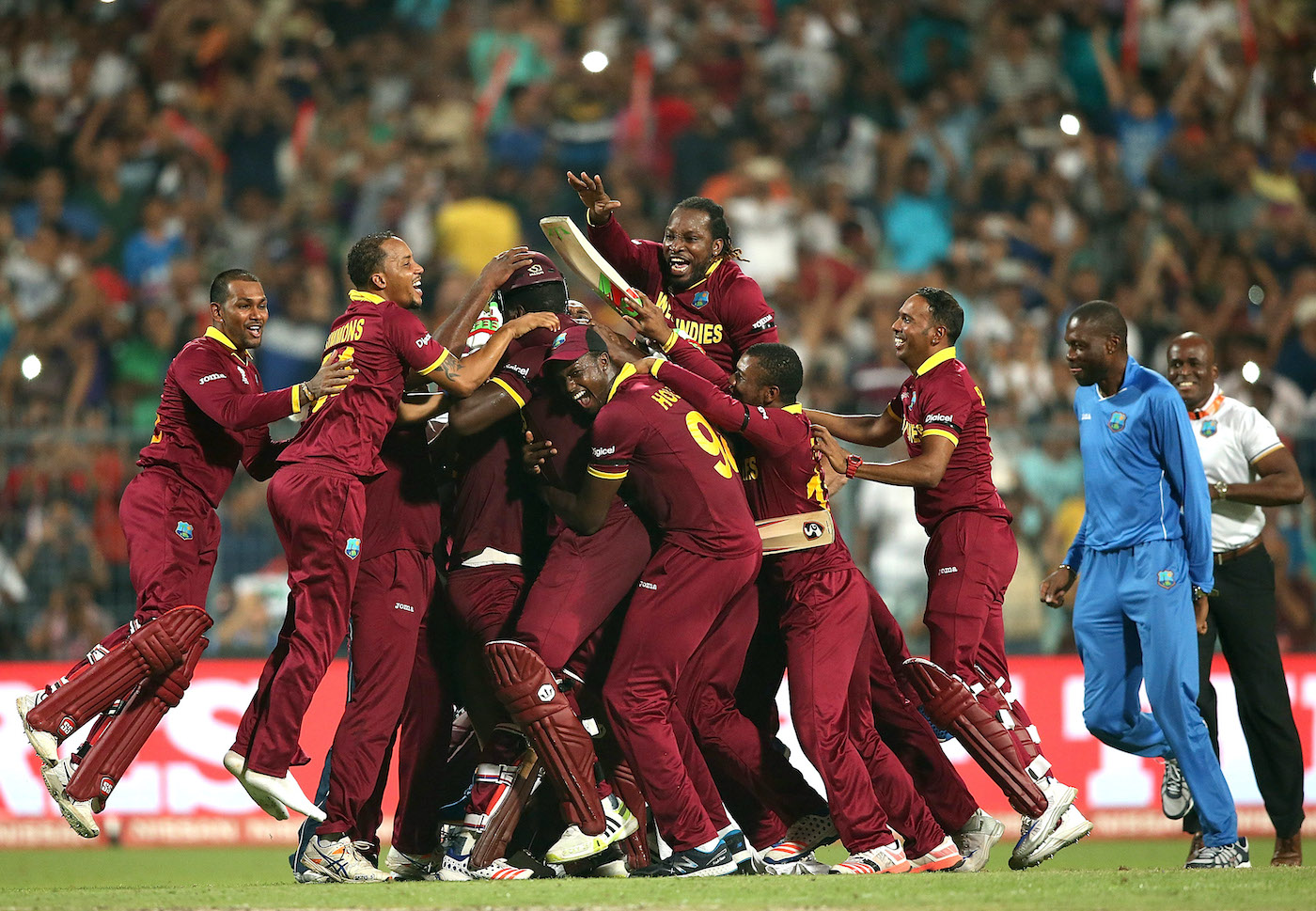 Carlos Brathwaite is mobbed by his team-mates