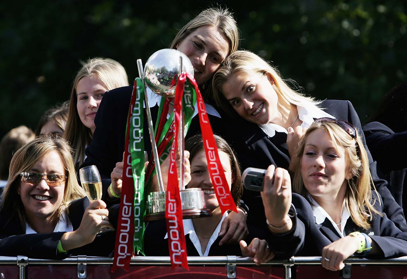 Brunt (second from right) enjoys the victory parade at Trafalgar Square