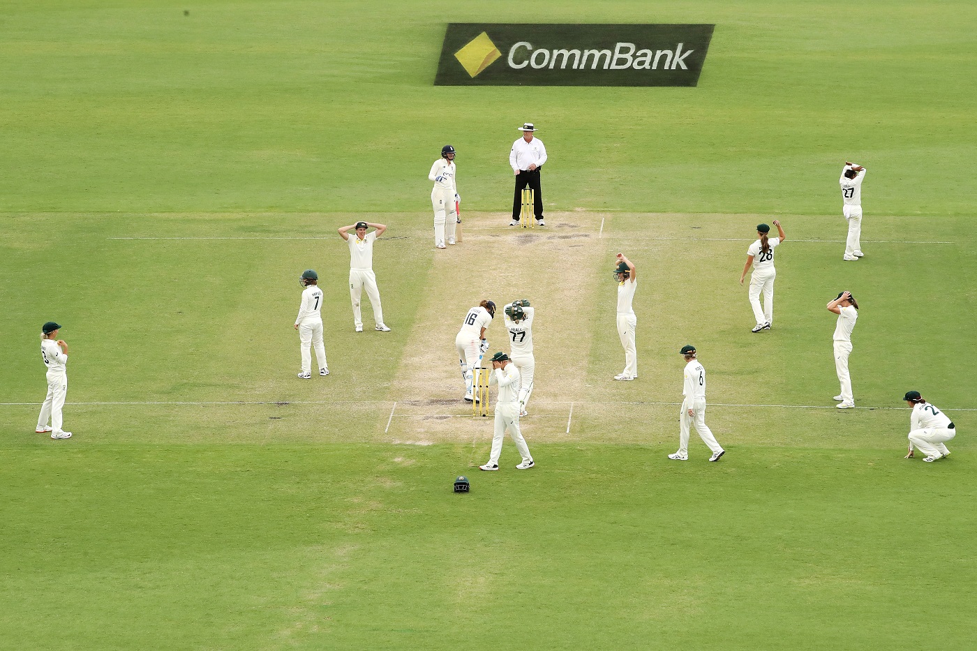 Australia are disappointed as Kate Cross safely sees out the last ball for a thrilling draw in the 2022 Canberra Test