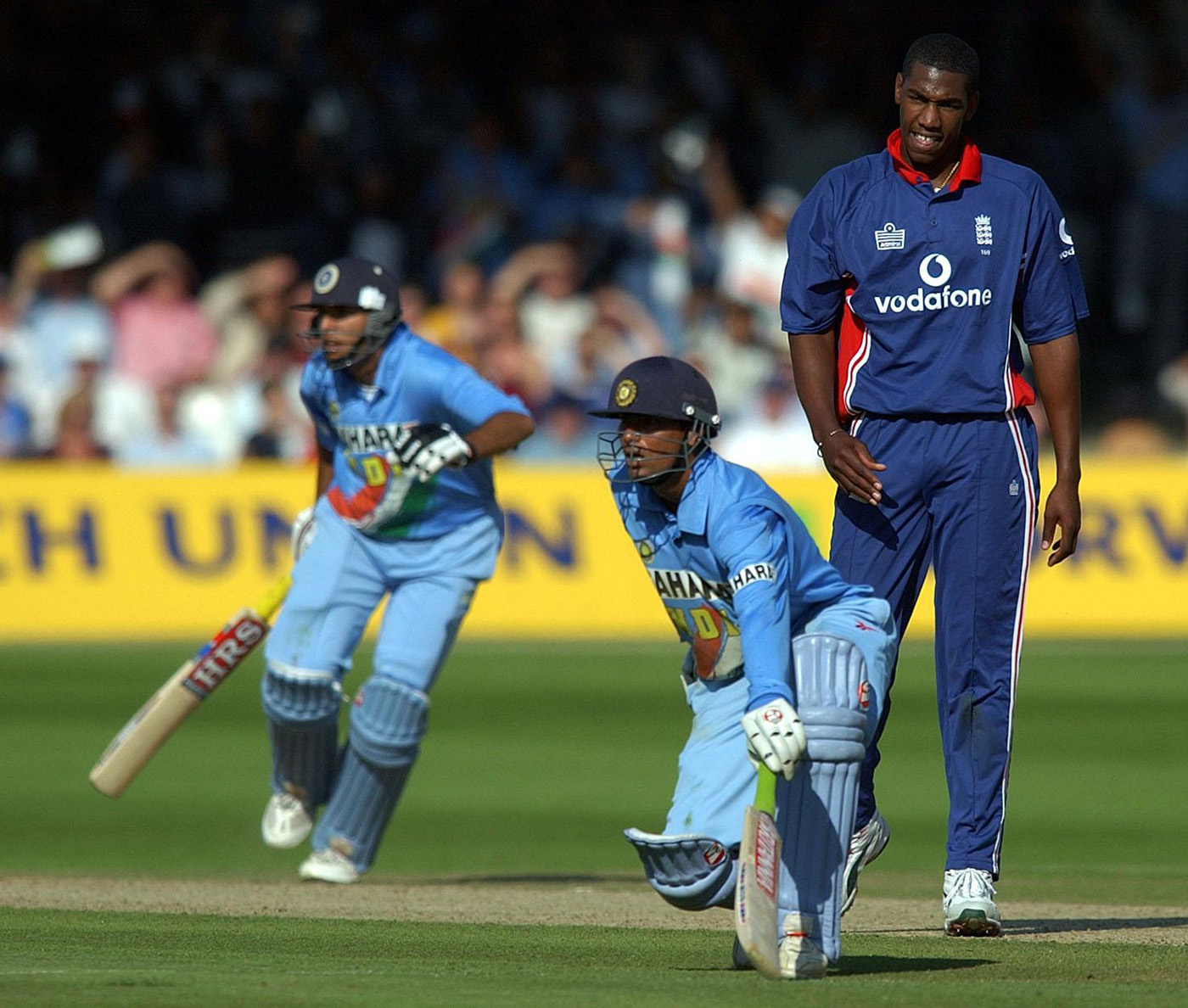 Alex Tudor looks on as Yuvraj Singh and Mohammad Kaif pile up the runs