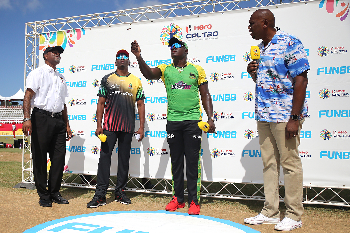 With Ian Bishop (first from right) at a CPL toss earlier this year. Bishop has spoken of how Powell's on-field persona and deportment have marked him out as a leader