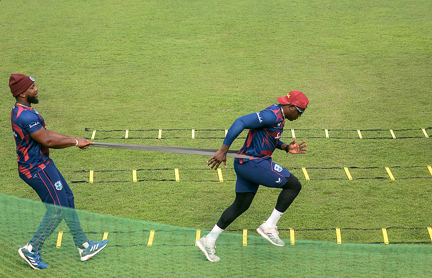 Powell trains with a little help from Sunil Ambris
