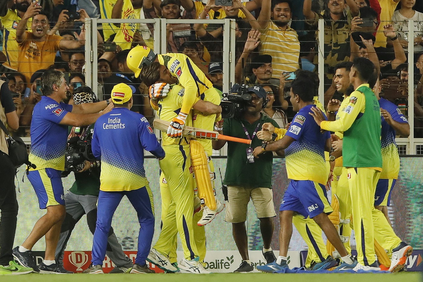 Heavy lifting: MS Dhoni is overcome with emotion after Ravindra Jadeja won the 2023 IPL final for CSK with a last-ball four
