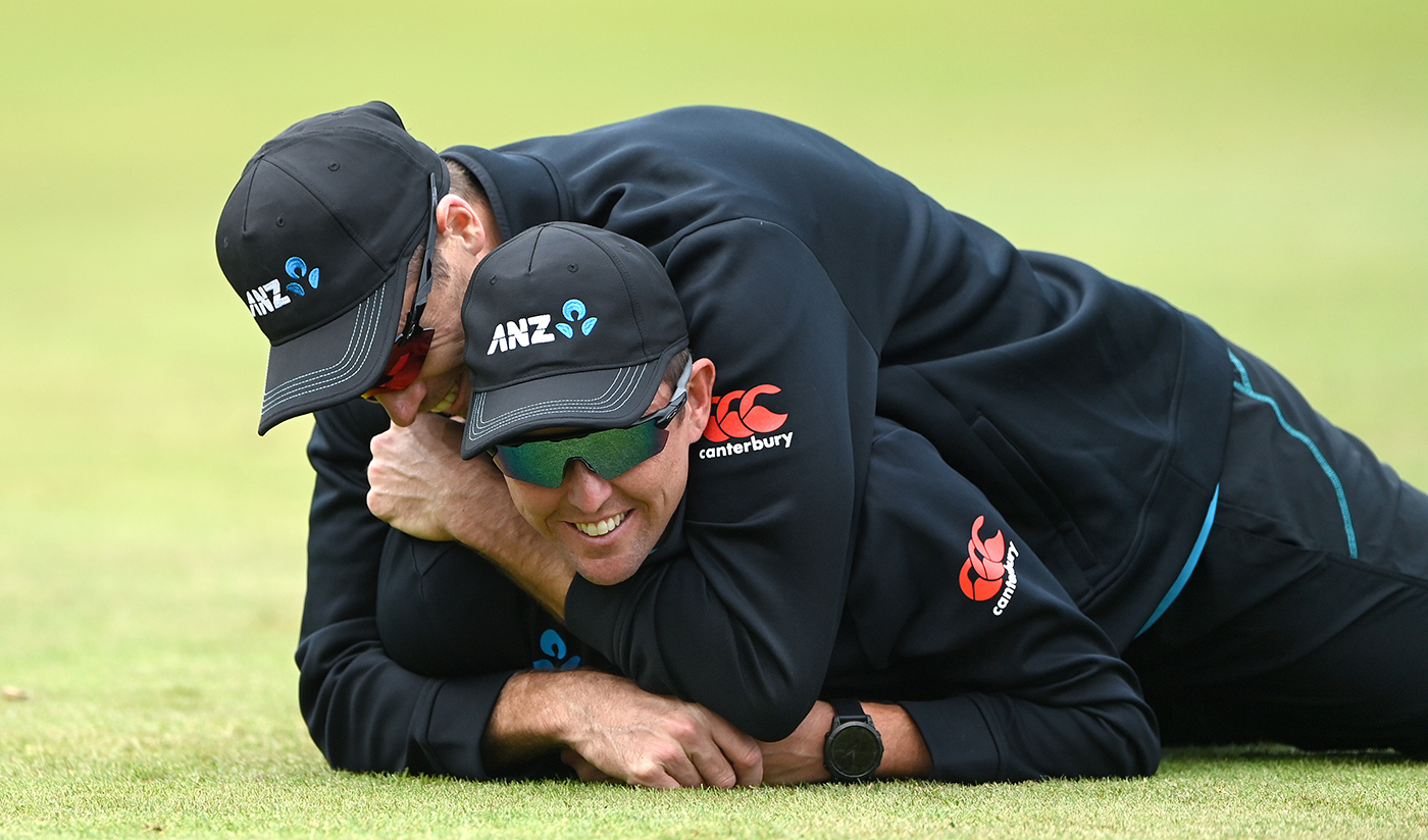 Tim Southee climbs on top of Trent Boult