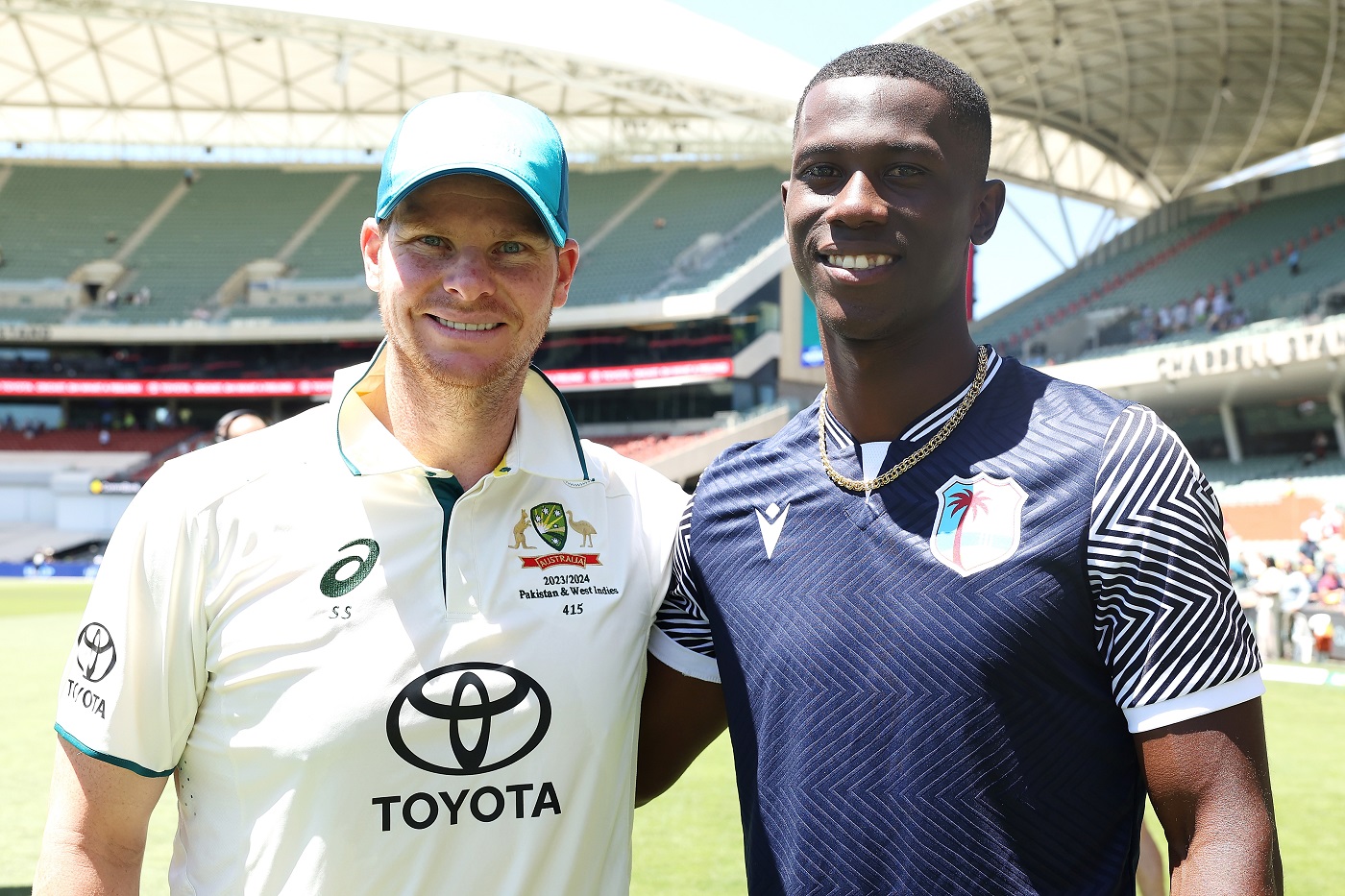 My hero, my scalp: Joseph with his favourite player and the first wicket in his Adelaide five-for, Steven Smith