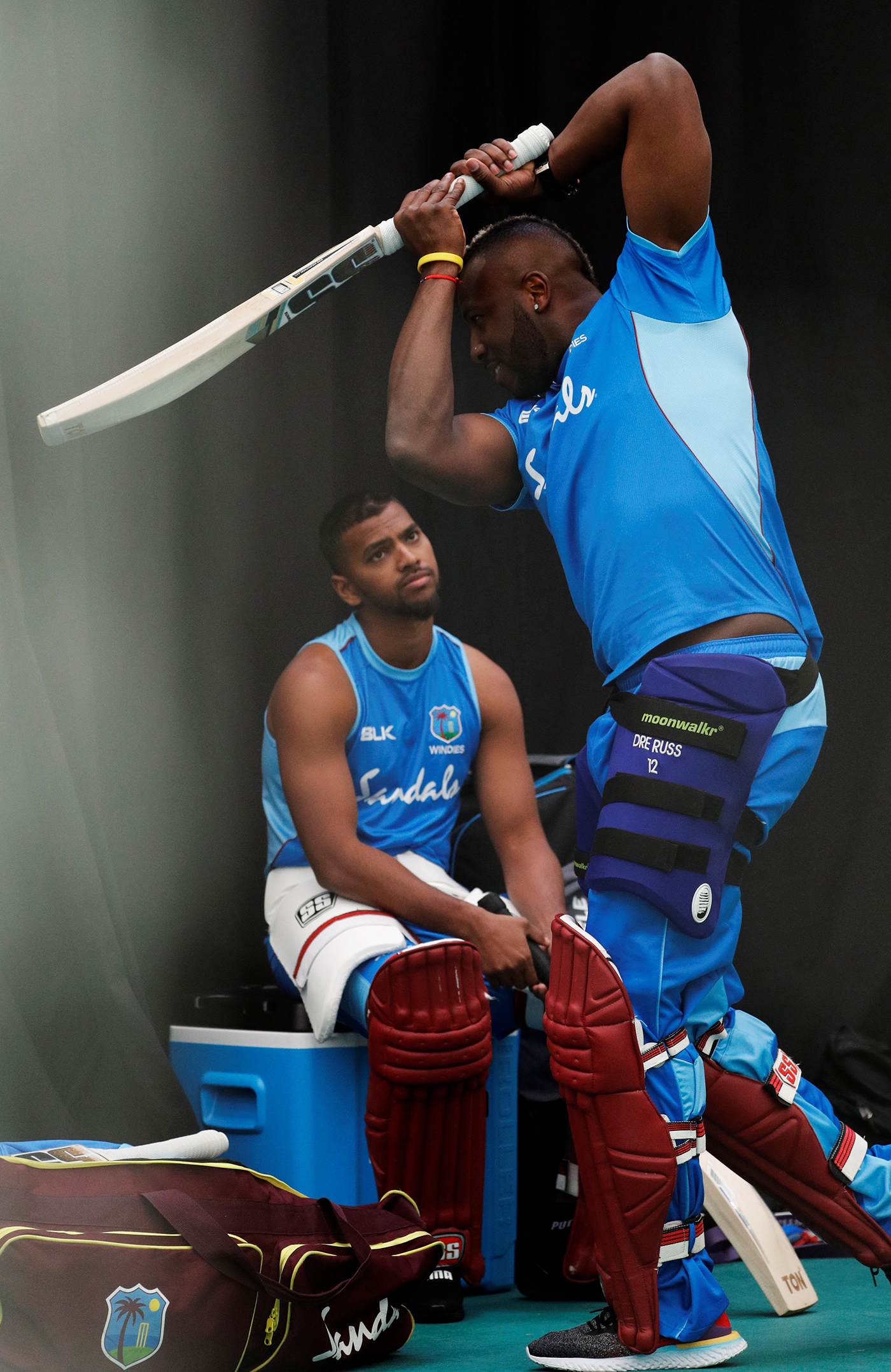 My scary friend: Pooran watches six-meister Andre Russell shadow-bat