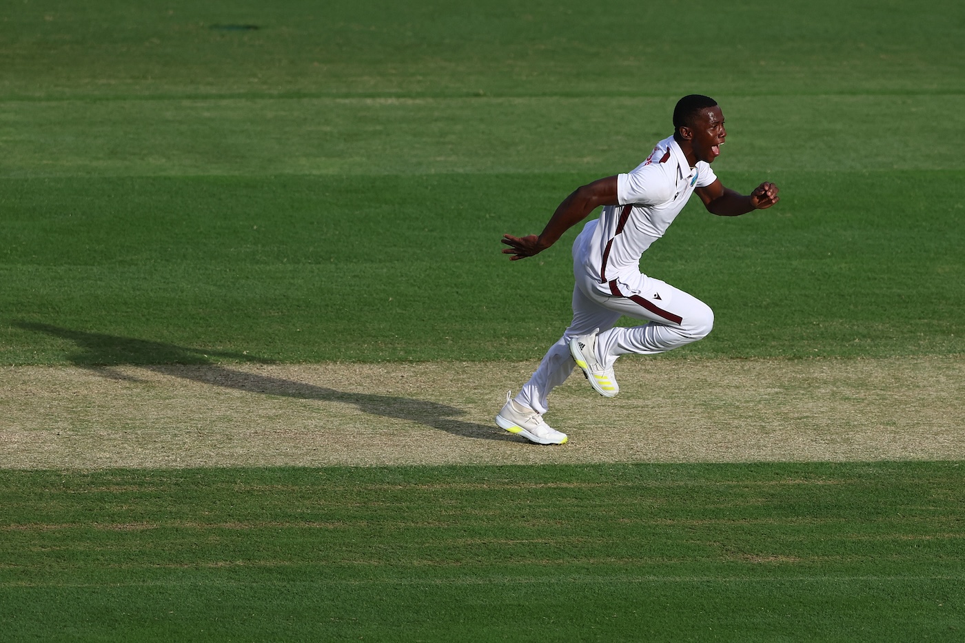Shamar Joseph sprints in celebration