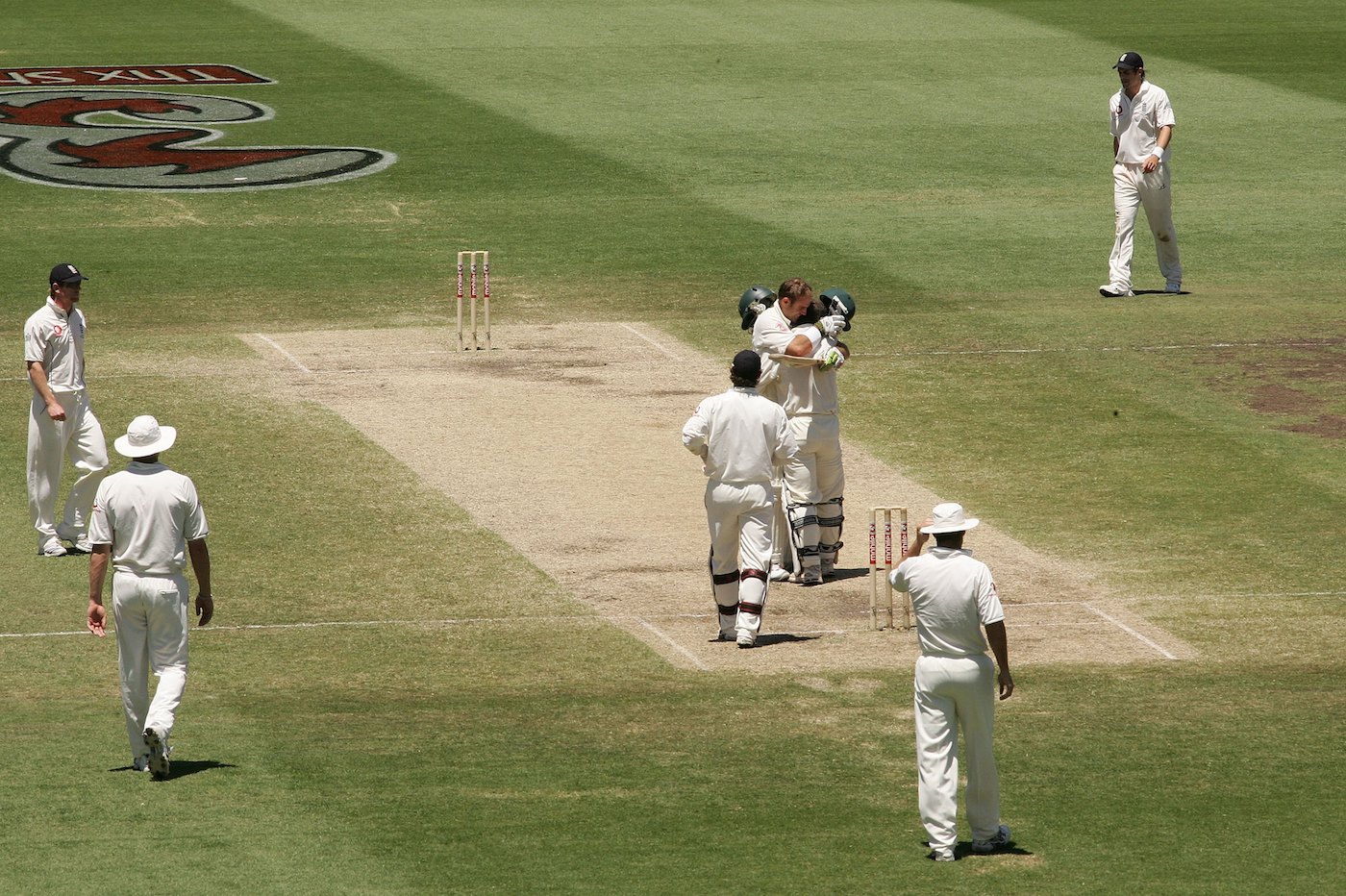 Matthew Hayden wraps a teary Justin Langer in a bear-hug after Australia swept the 2006-07 Ashes