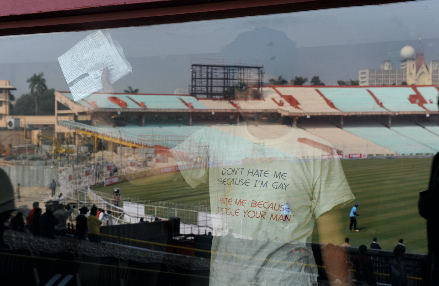 A window cleaner watches the Sri Lanka team practise at Eden Gardens