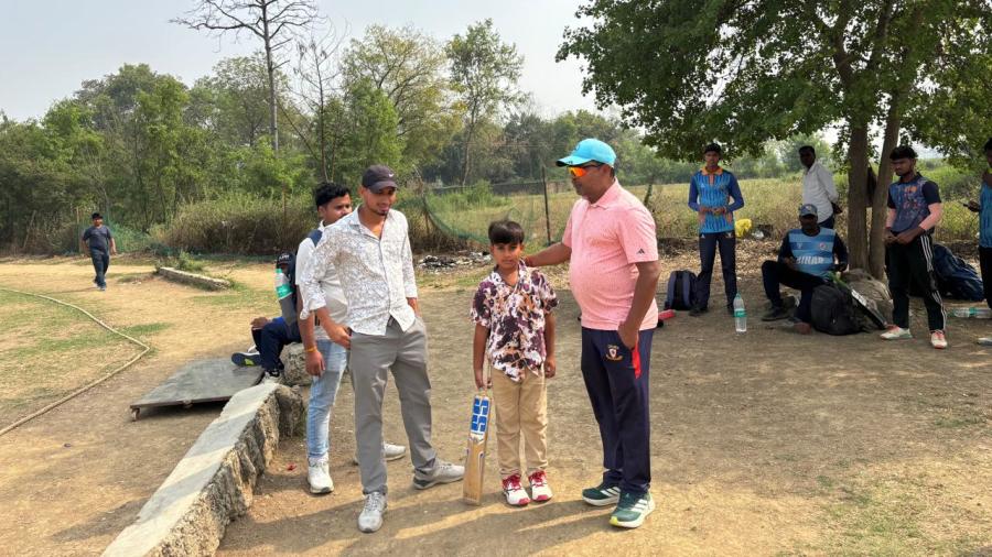 He makes heroes: Manish Ojha of the Gen Next academy, where Sooryavanshi trained, with a young aspiring cricketer