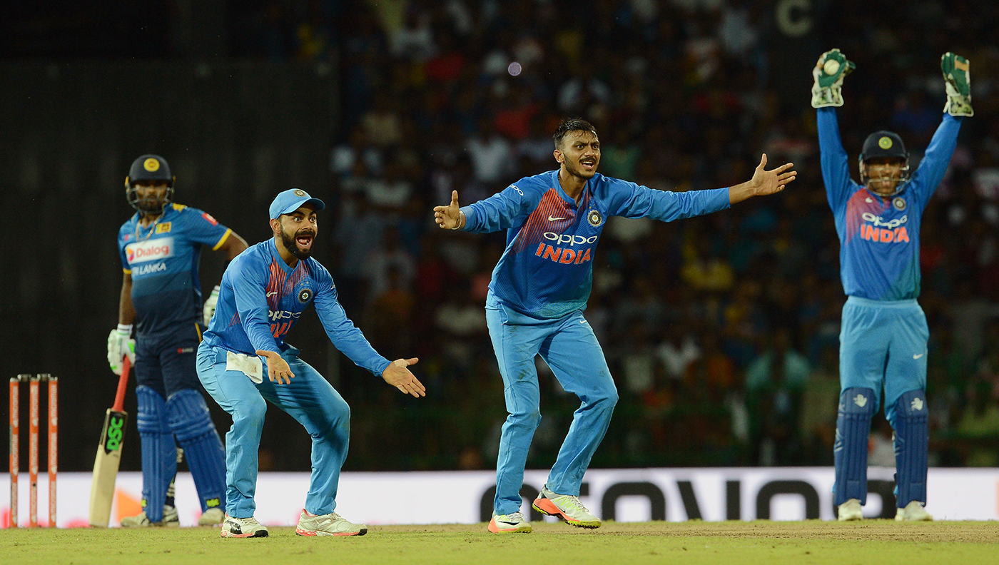 Mahi mentor: the guidance of MS Dhoni (right) has been invaluable to Axar